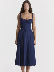 The new summer dress for women features a cinched waist and a split halter