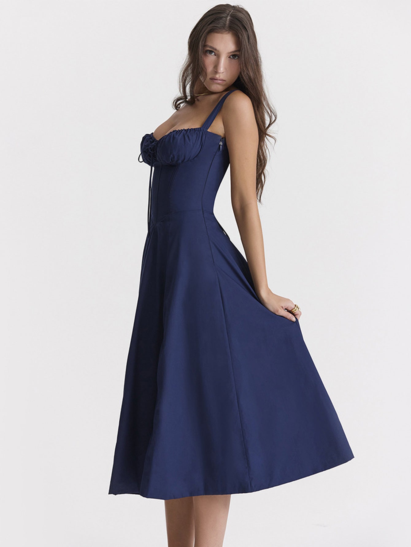 The new summer dress for women features a cinched waist and a split halter