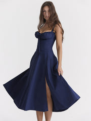 The new summer dress for women features a cinched waist and a split halter