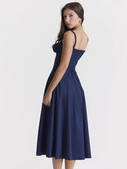 The new summer dress for women features a cinched waist and a split halter