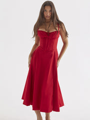 The new summer dress for women features a cinched waist and a split halter