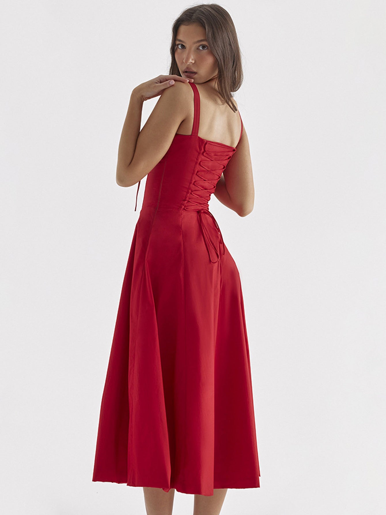 The new summer dress for women features a cinched waist and a split halter